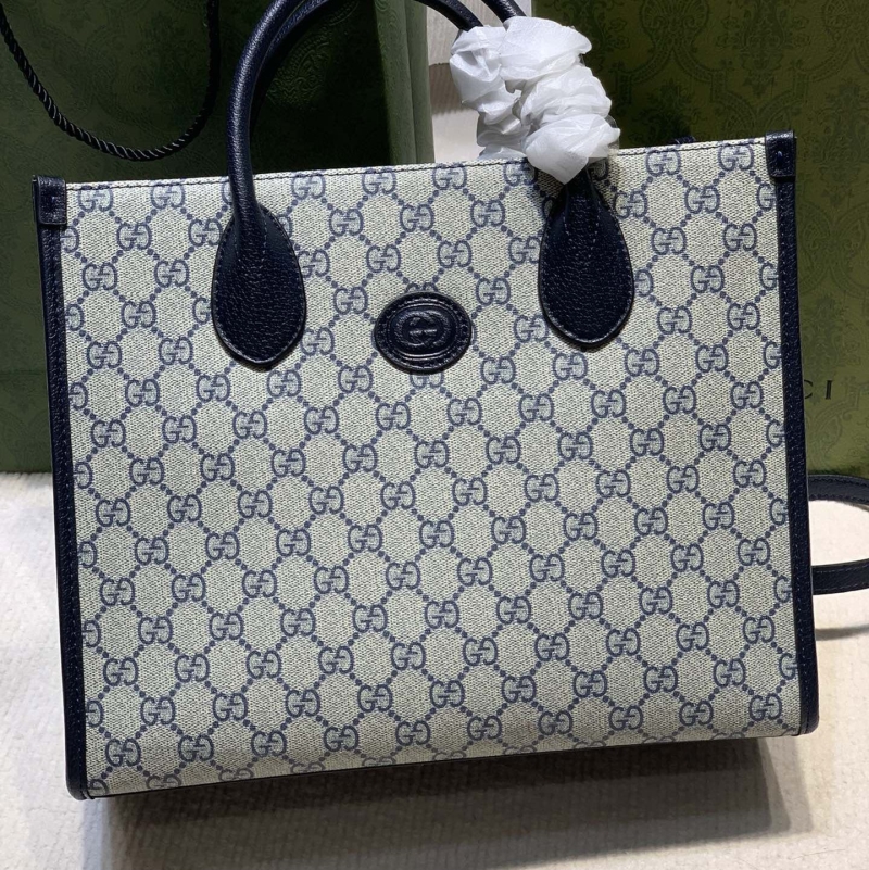 G*u*i shopping bags